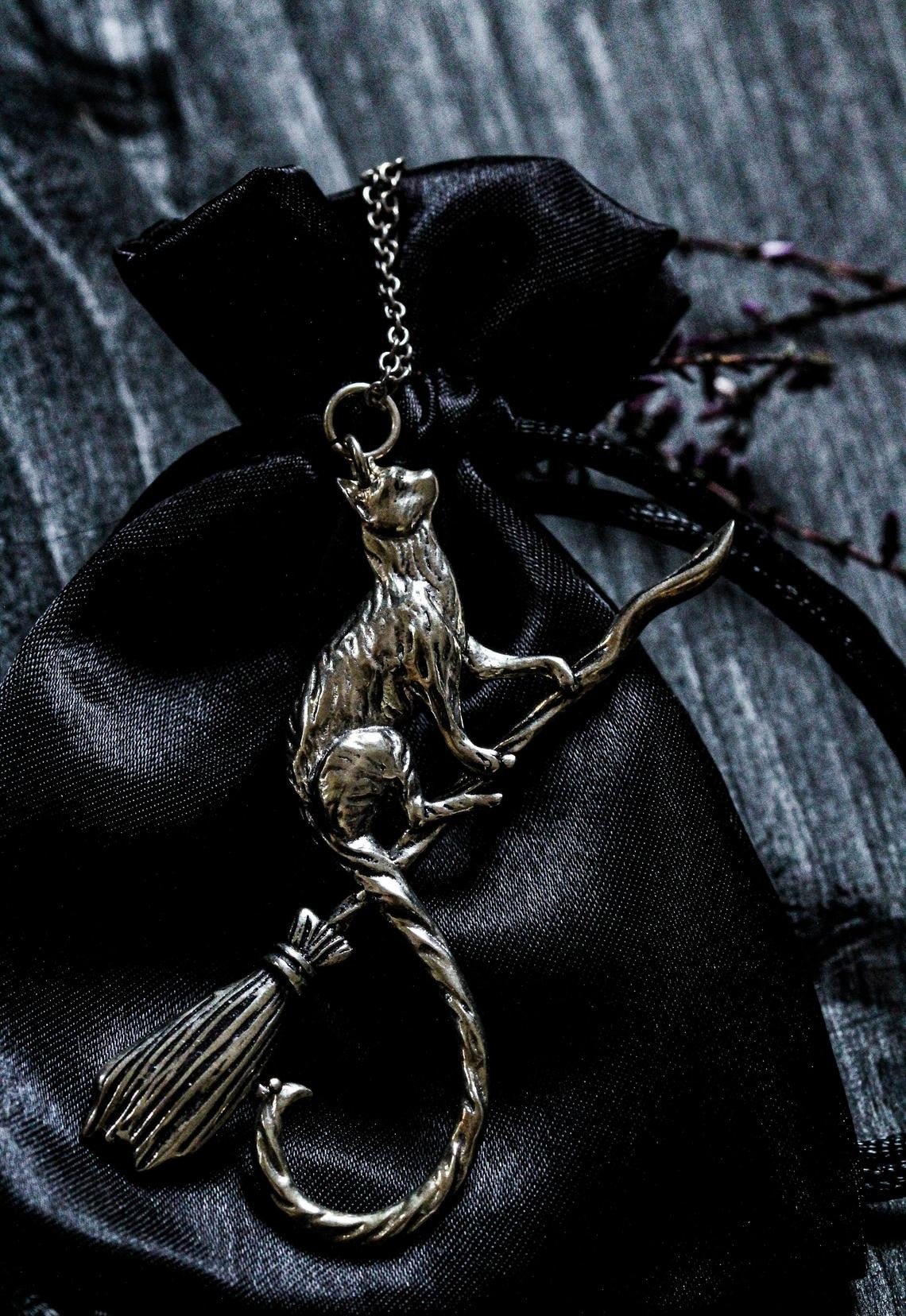 The Cat on a Broomstick necklace - Style's Bug