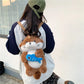 Otter Holding Fish Backpack