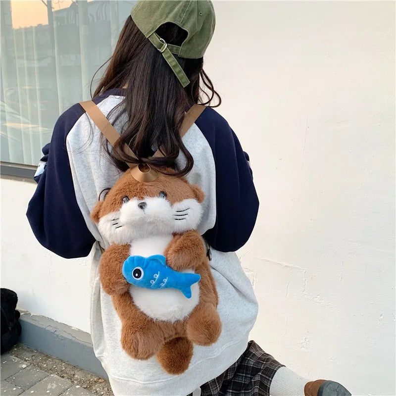 Otter Holding Fish Backpack