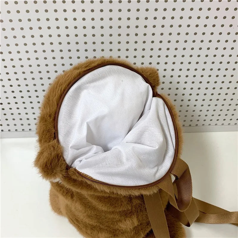 Otter Holding Fish Backpack